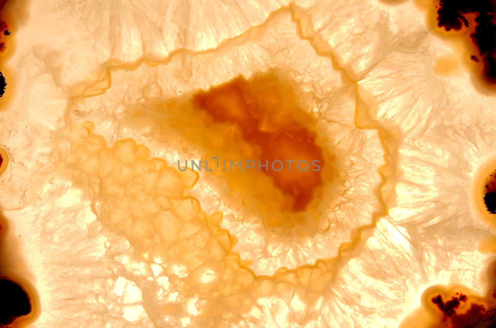 Close up of a thinly sliced backlit natural agate