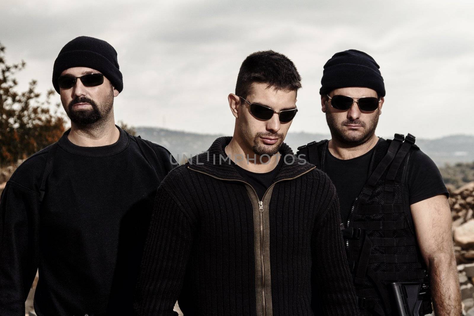 View of a group of gang members with guns.