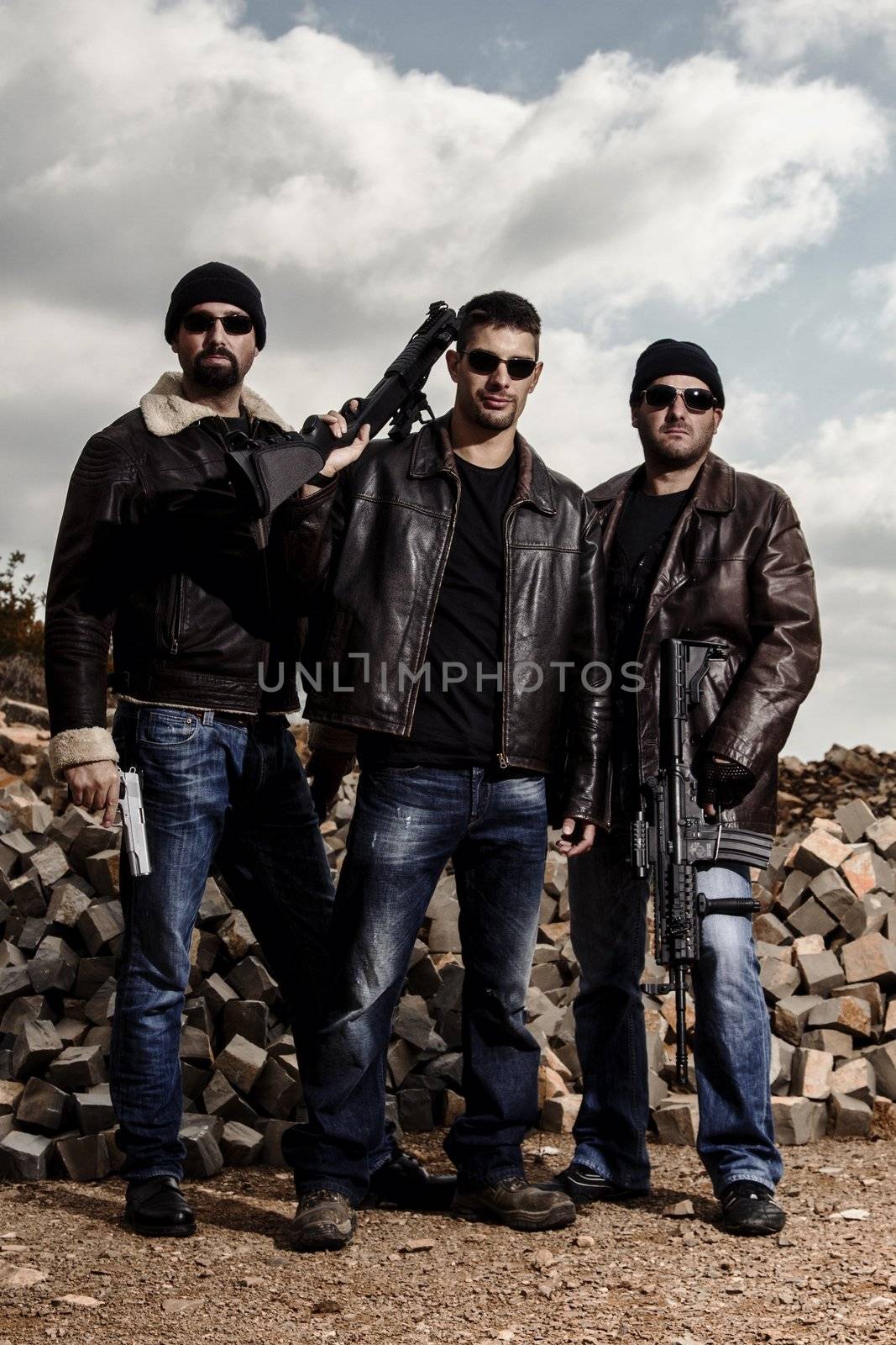 View of a group of gang members with guns.