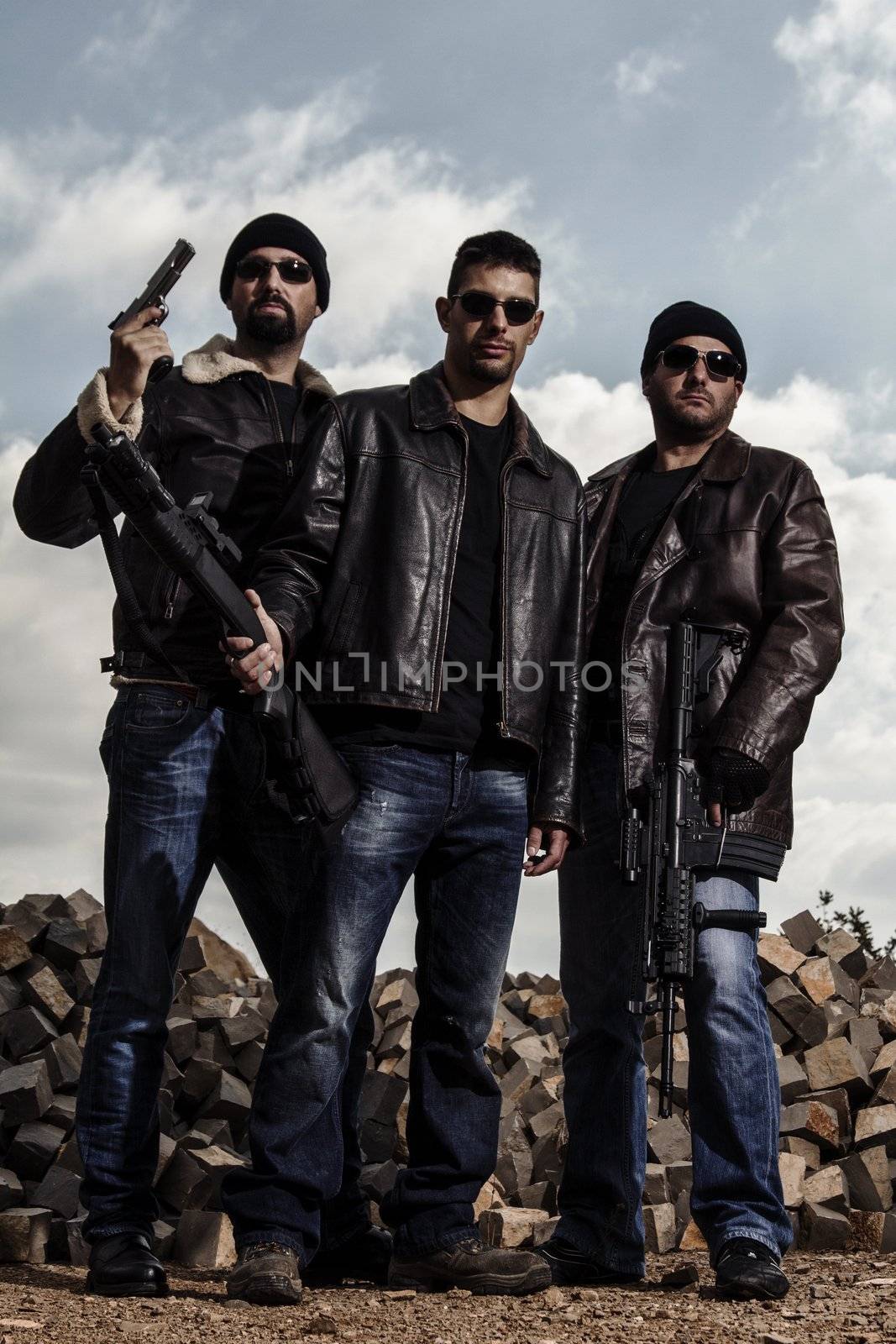 View of a group of gang members with guns.