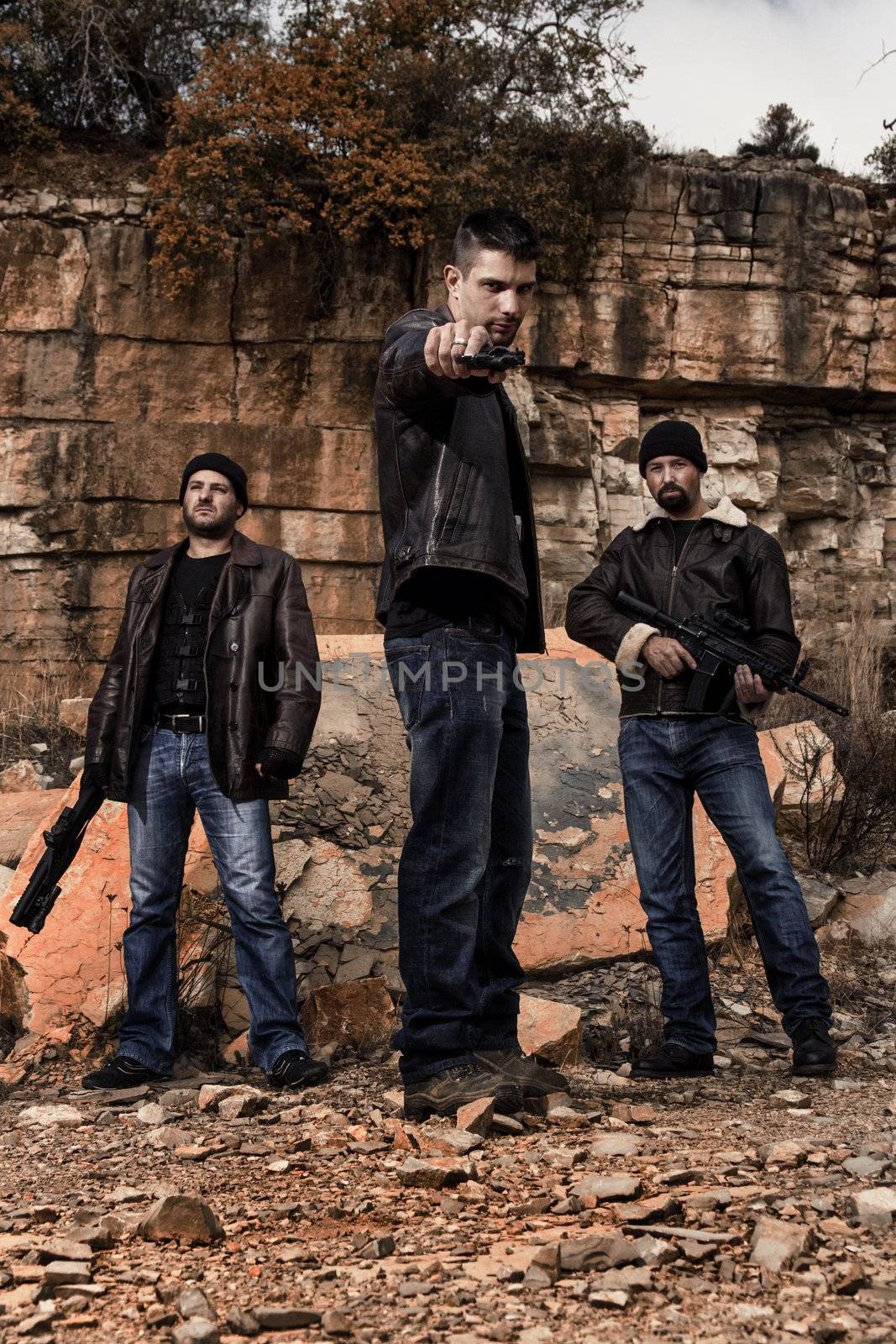 View of a group of gang members with guns.