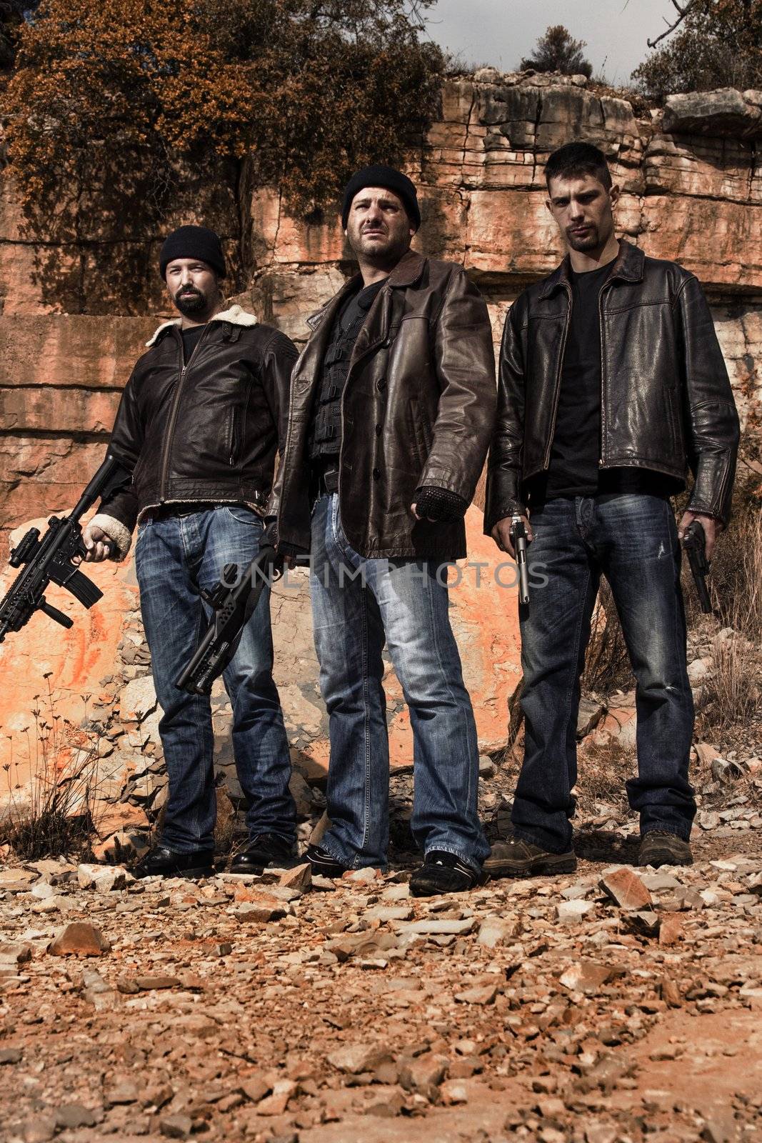 View of a group of gang members with guns.