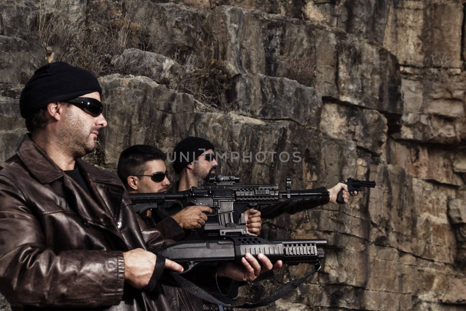 View of a group of gang members with guns.