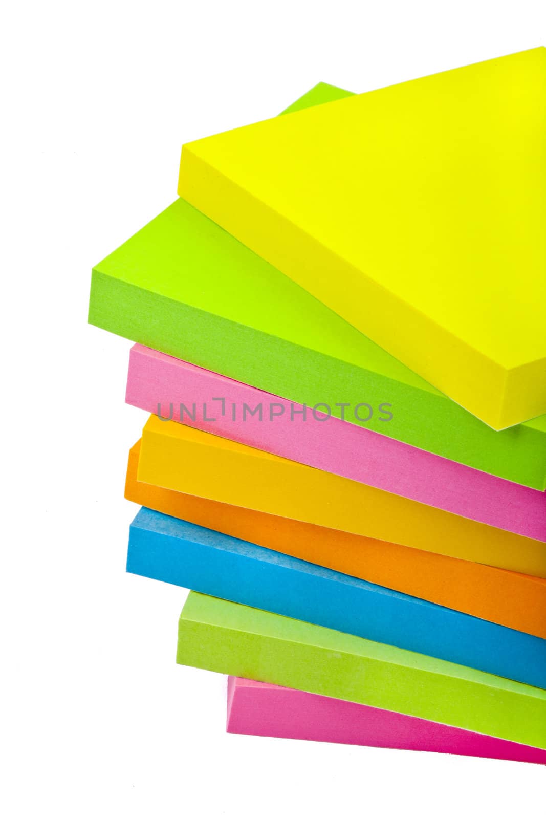 Stack of Sticky Note Pads over a white background.