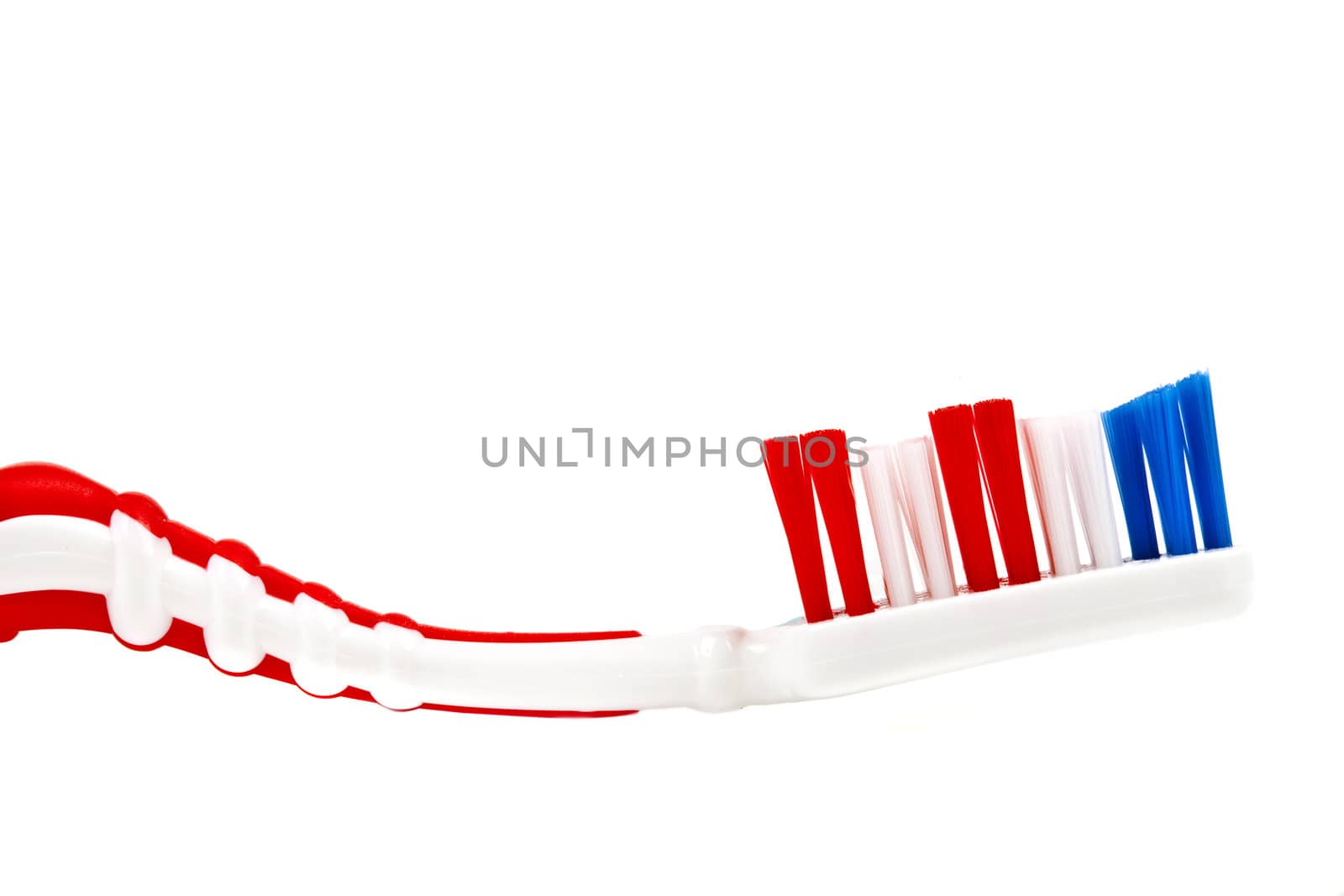 Close-up of a Toothbrush over a white background.