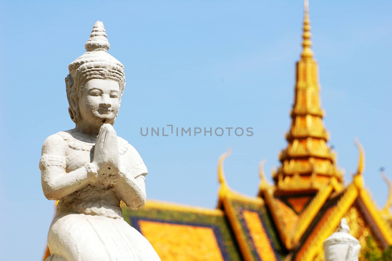 Buddha sculpture in front of the golden temple in Phnom Penh,Cambodia
