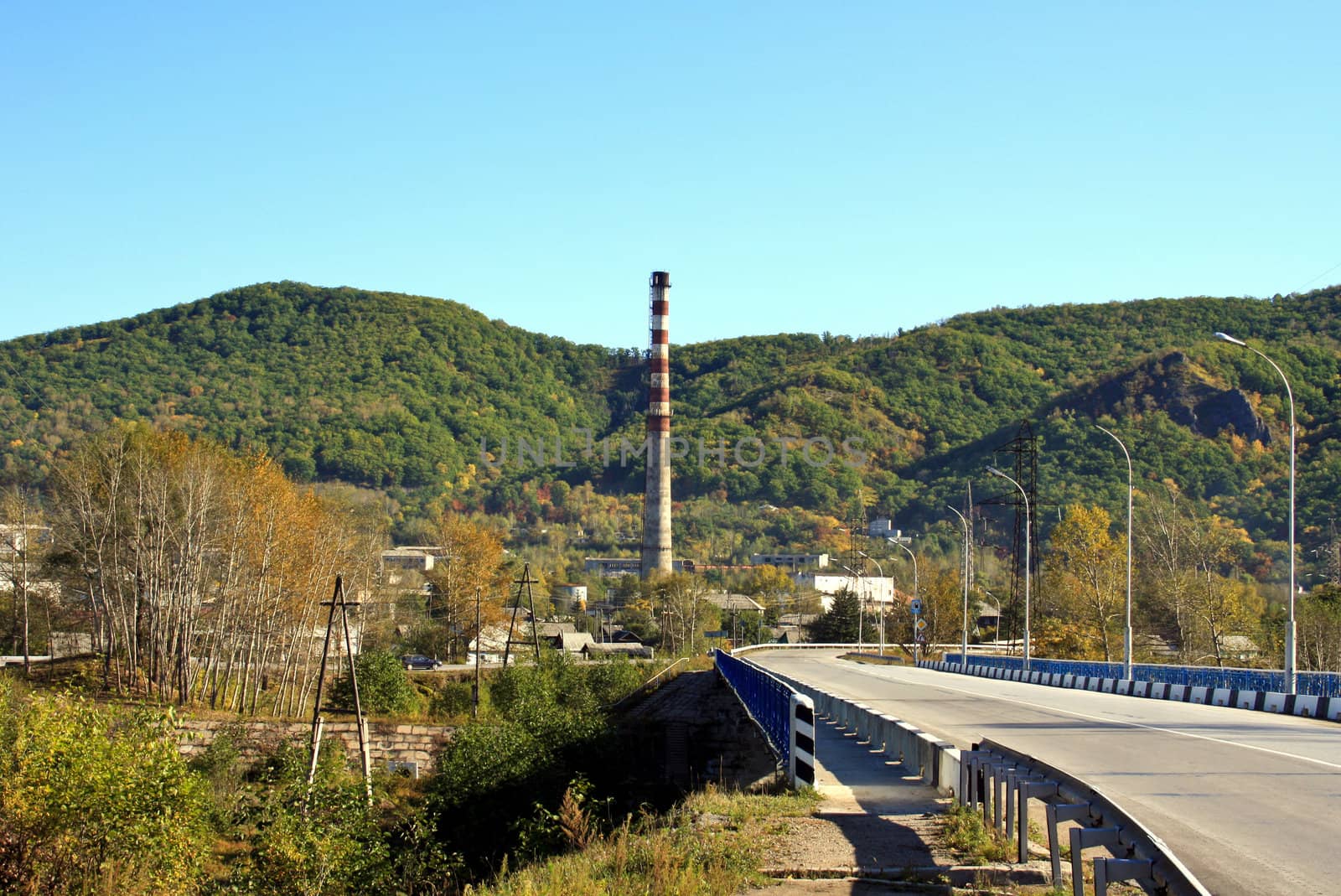 Autumn landscape of a city in mountain area