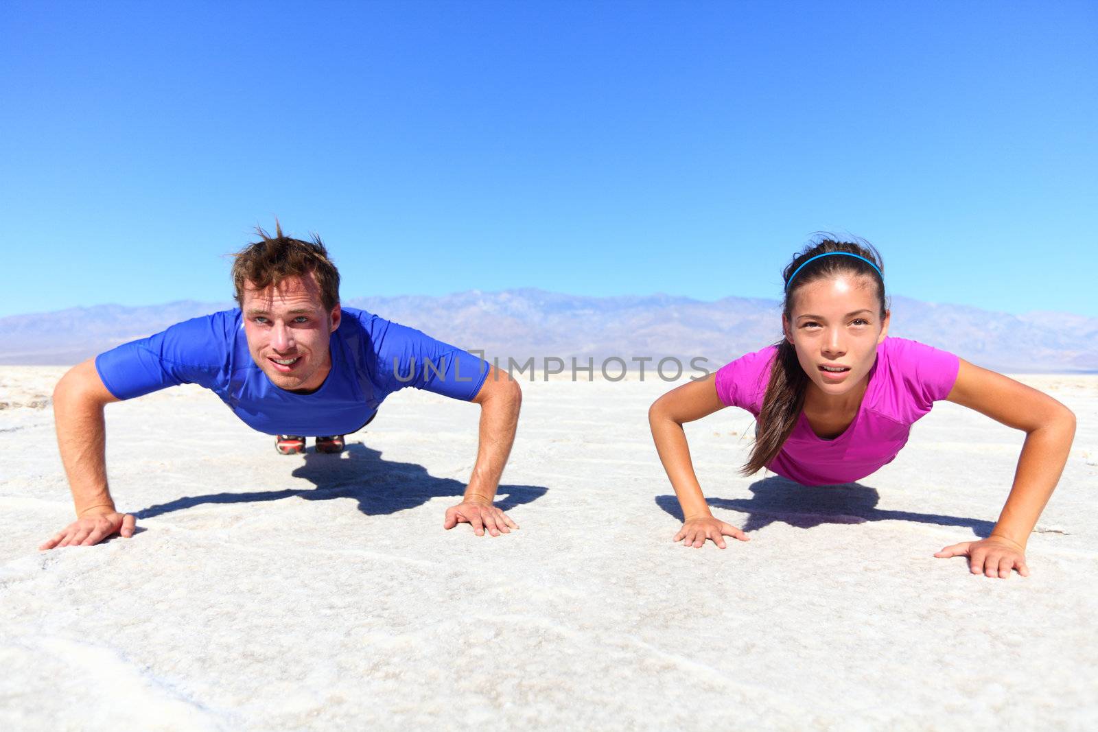 Sport - young fitness couple by Maridav