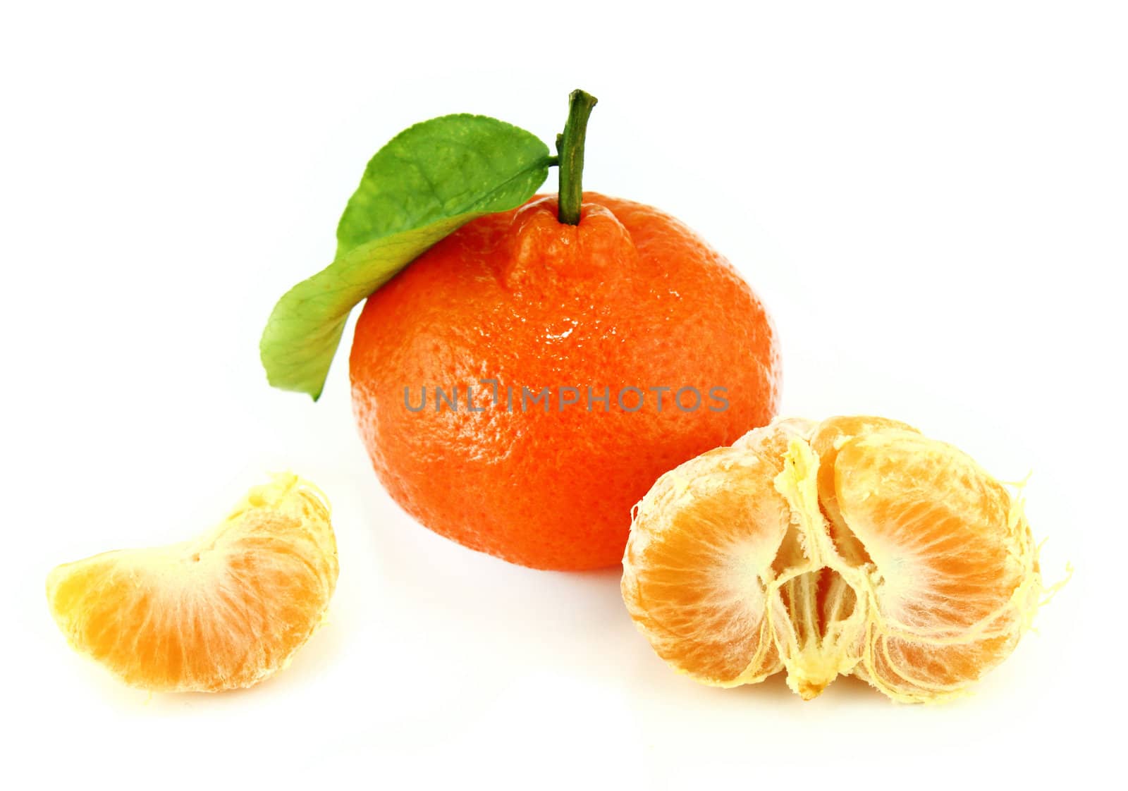 fresh mandarin with leaf isolated on white.