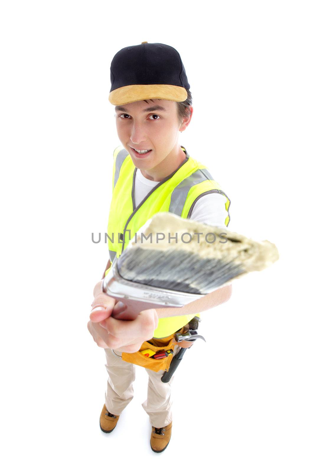 Painter standing and holding using a paintbrush.  White background.