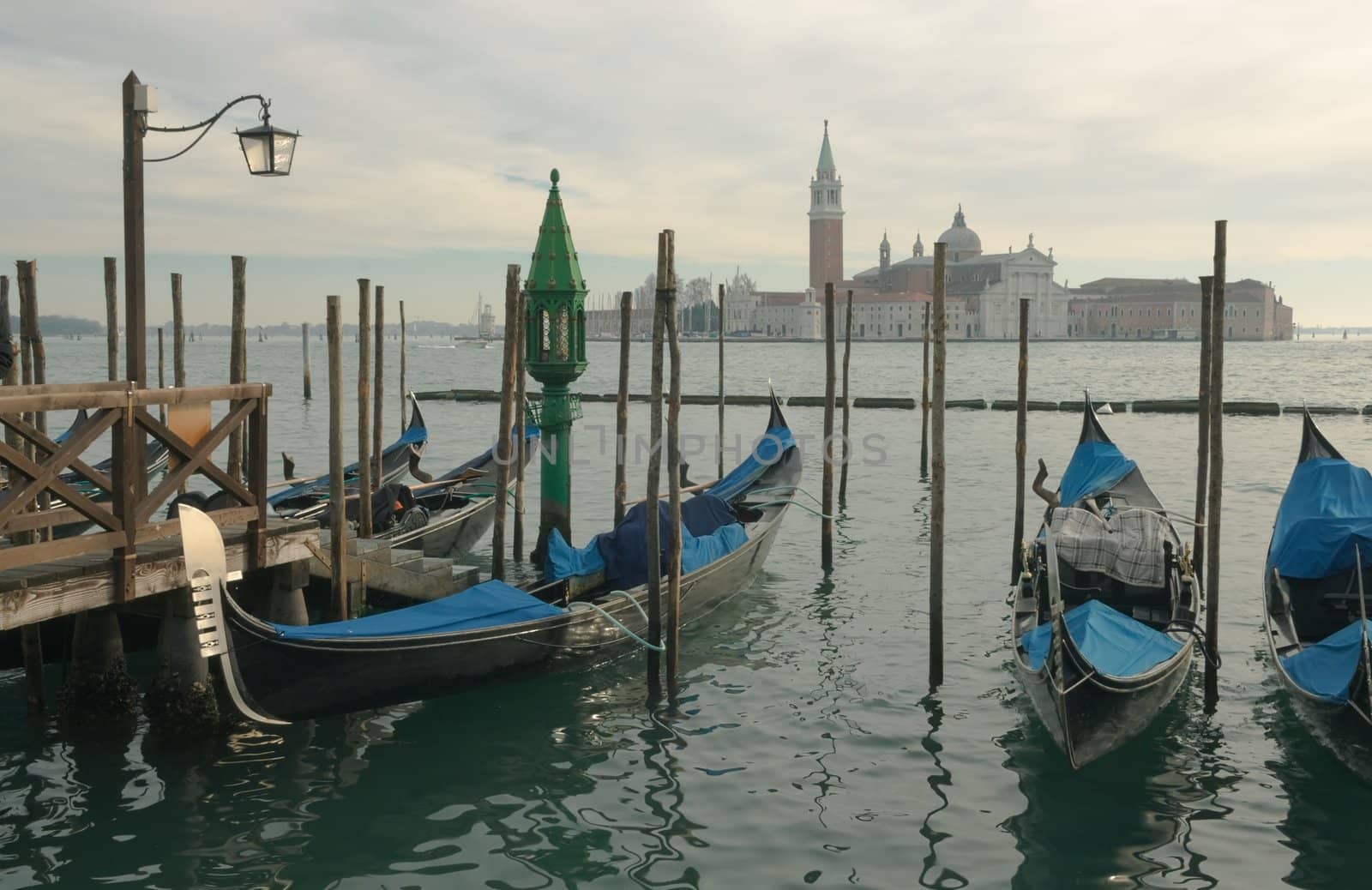 Gondolas in Venice, opposite the island of San Giorgio in winter