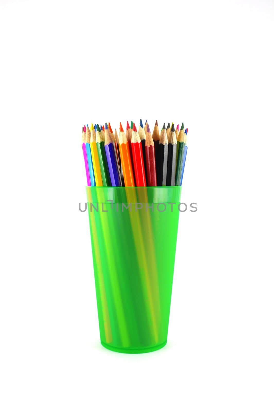 Color pencils in the green prop over white by sergpet