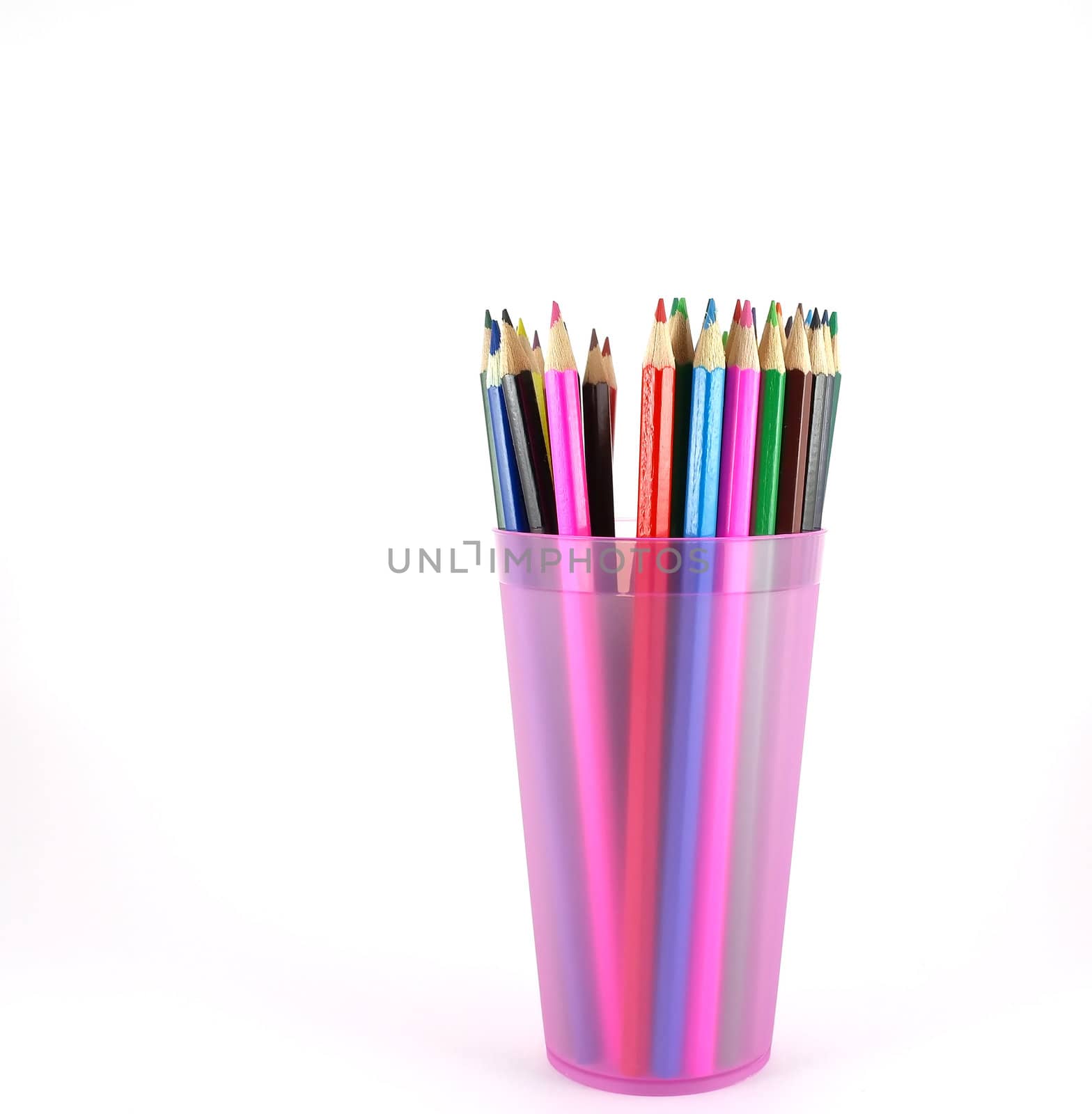 Color pencils in the pink prop over white by sergpet