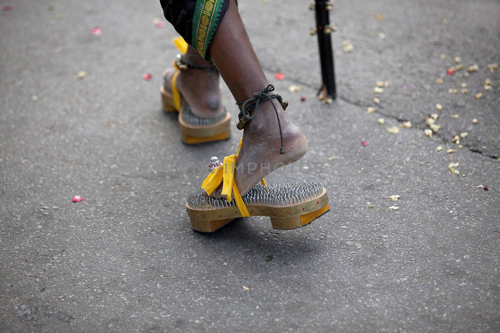 Devotee walking in the Thaipusam festival in Singapore