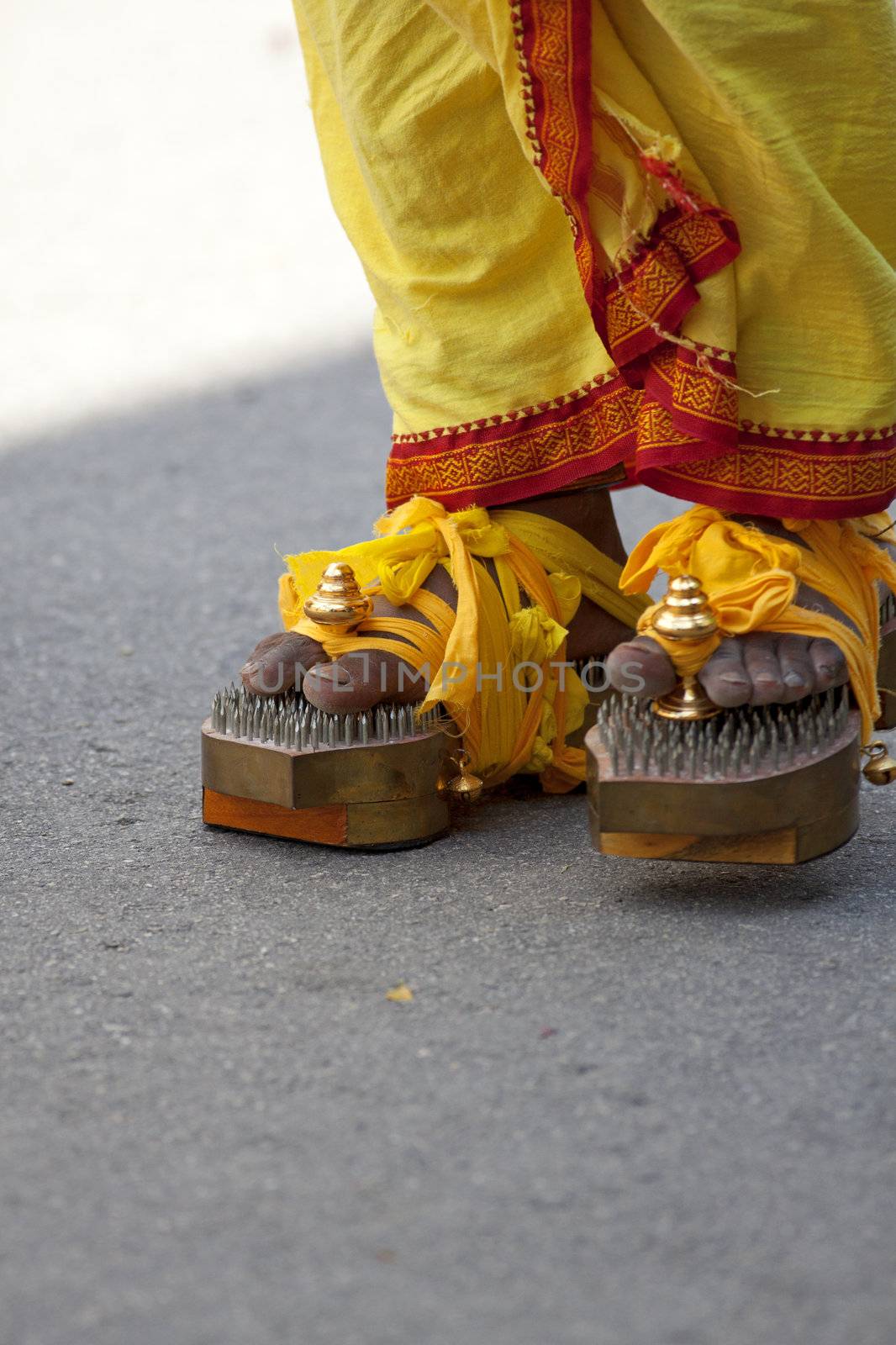 Devotee walking in the Thaipusam festival in Singapore