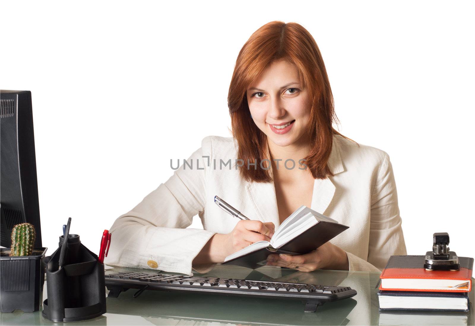 woman writes in a notebook sitting at a desk  by gurin_oleksandr