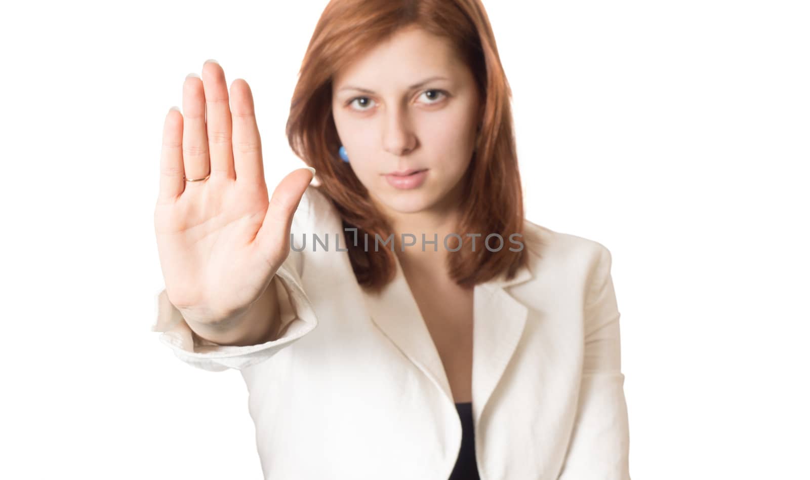 girl with golden hair shows banning hand gesture isolated on white background