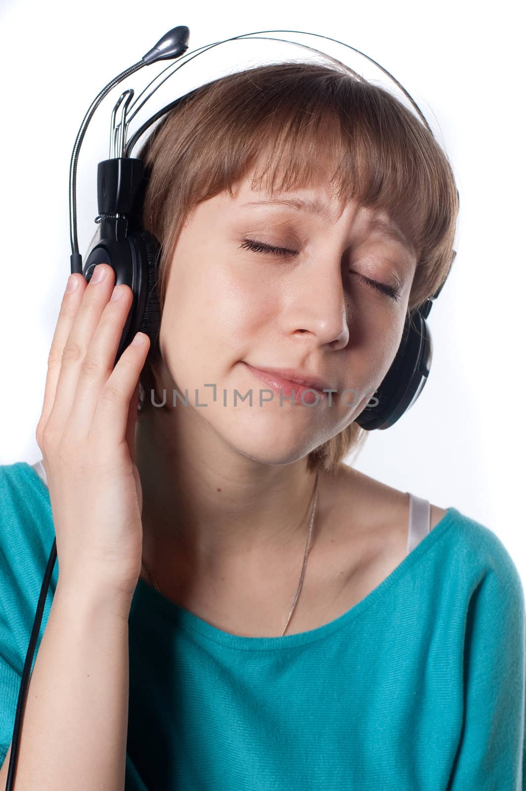 girl enjoys music on headphones by Triphka