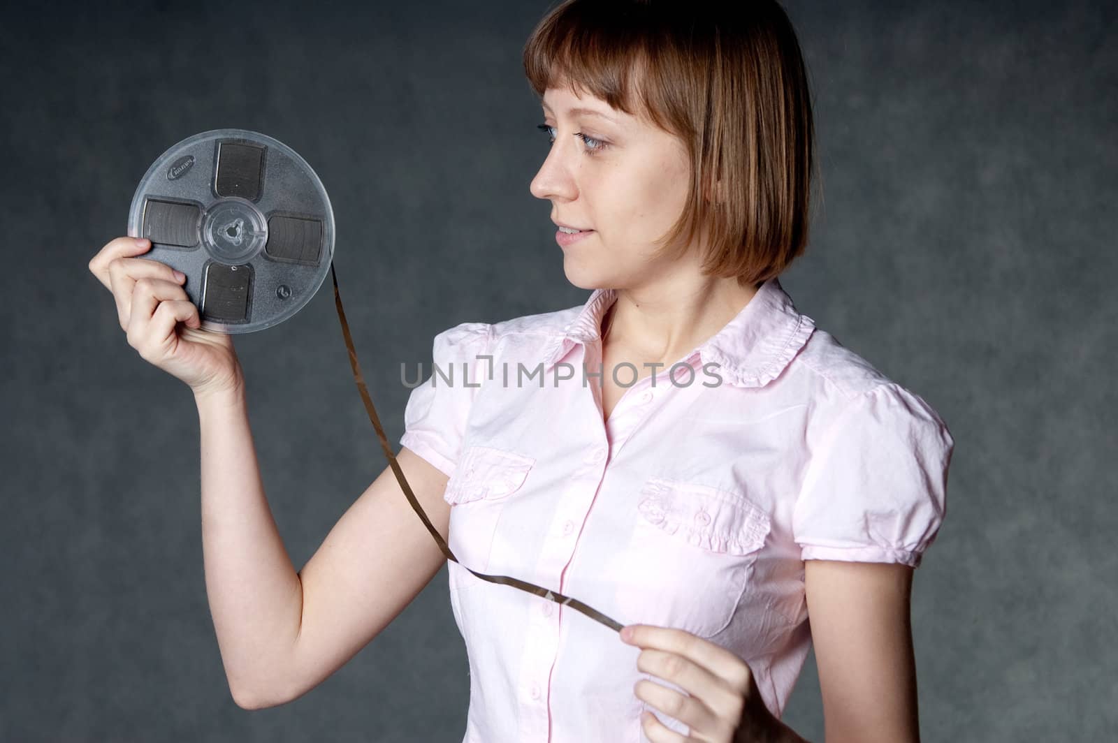 young girl pulls the film