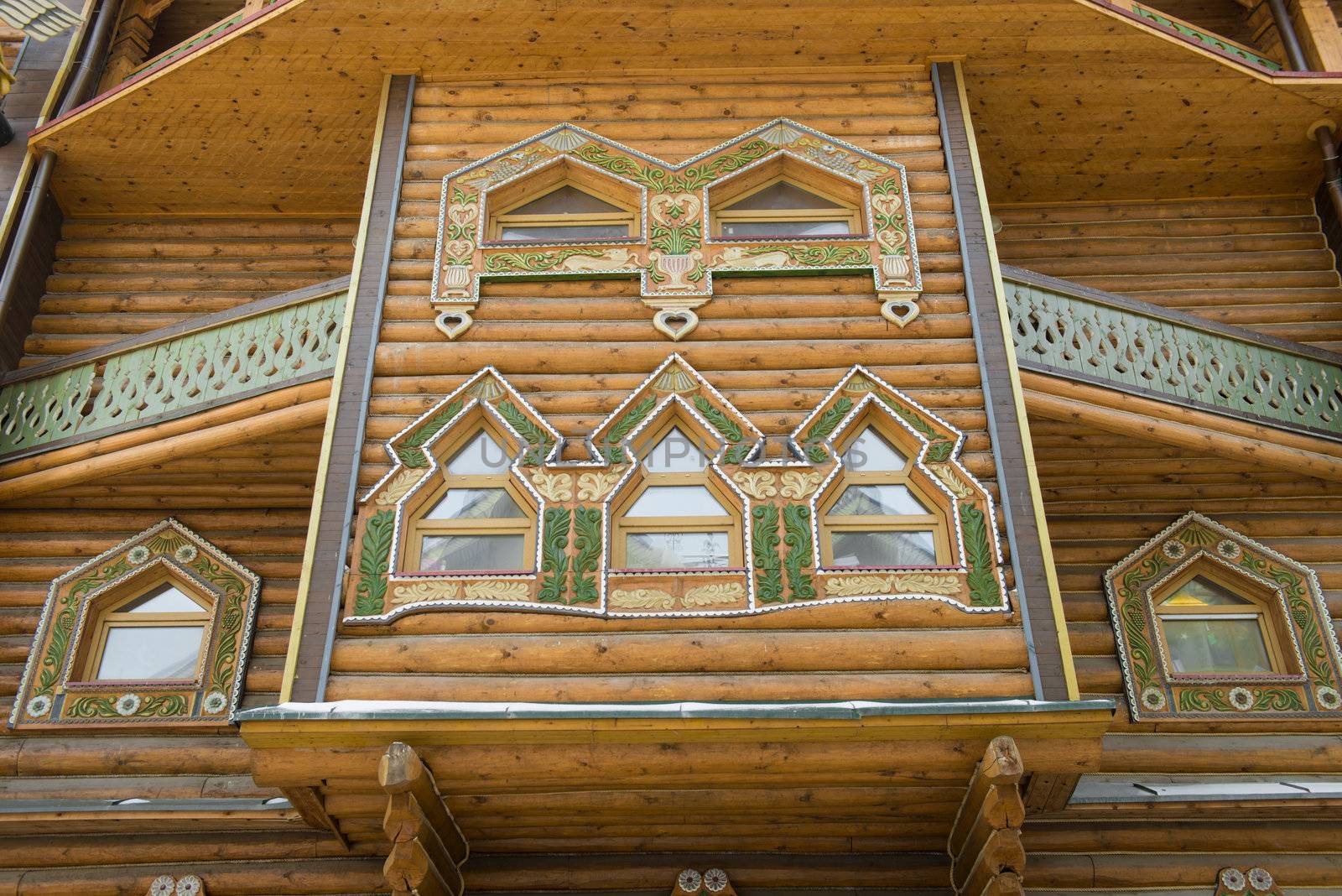 Traditional raussian ornament of wooden house in Izmailovskiy Kremlin, Moscow  - January 2013.