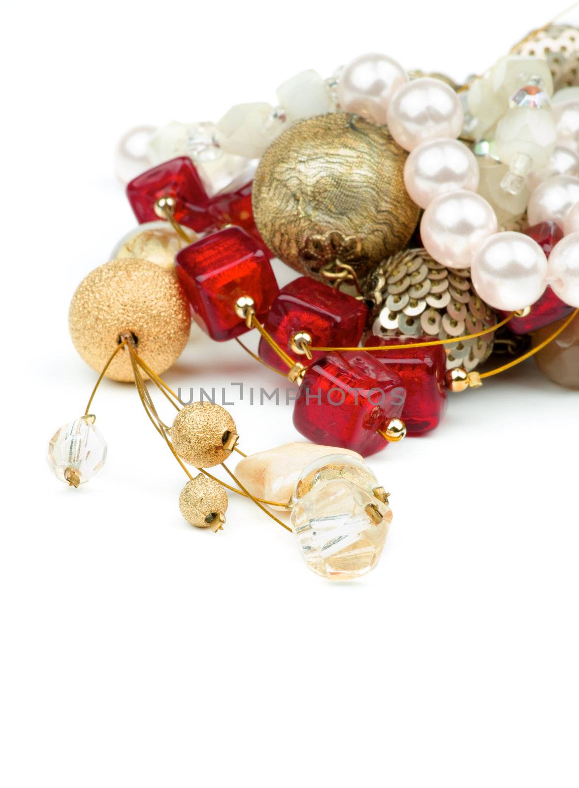 Arrangement Gold Pendant, Ruby Necklace and Jewelry closeup on white background