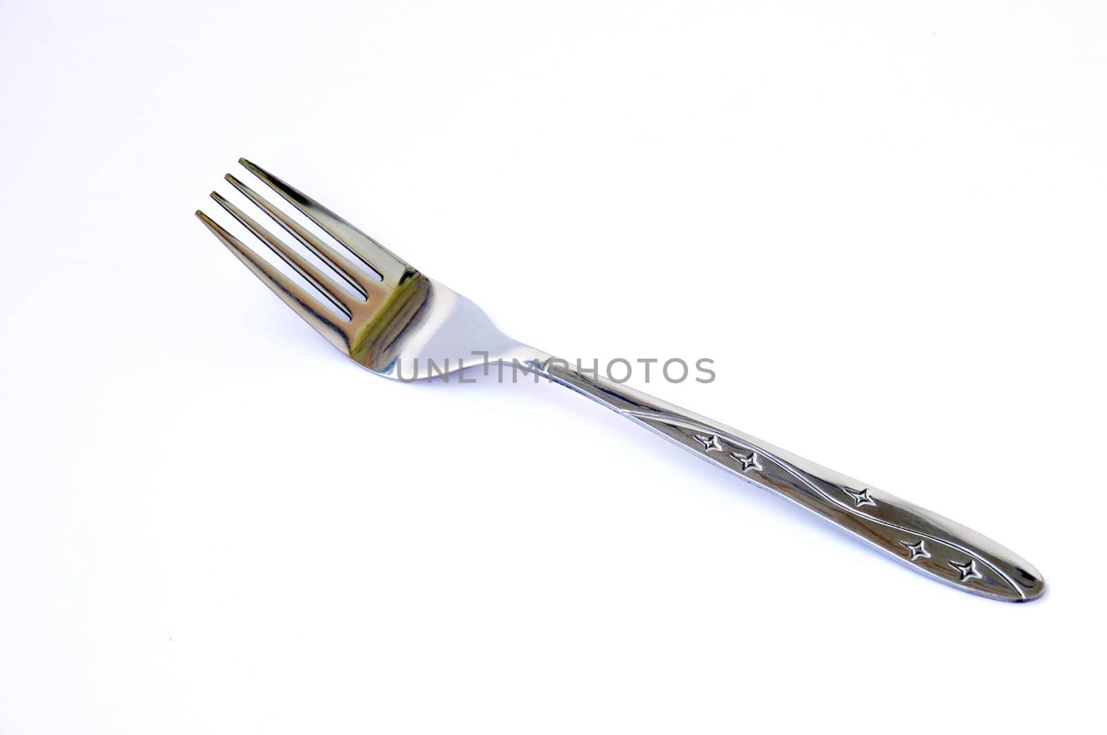 Stainless fork on a white background