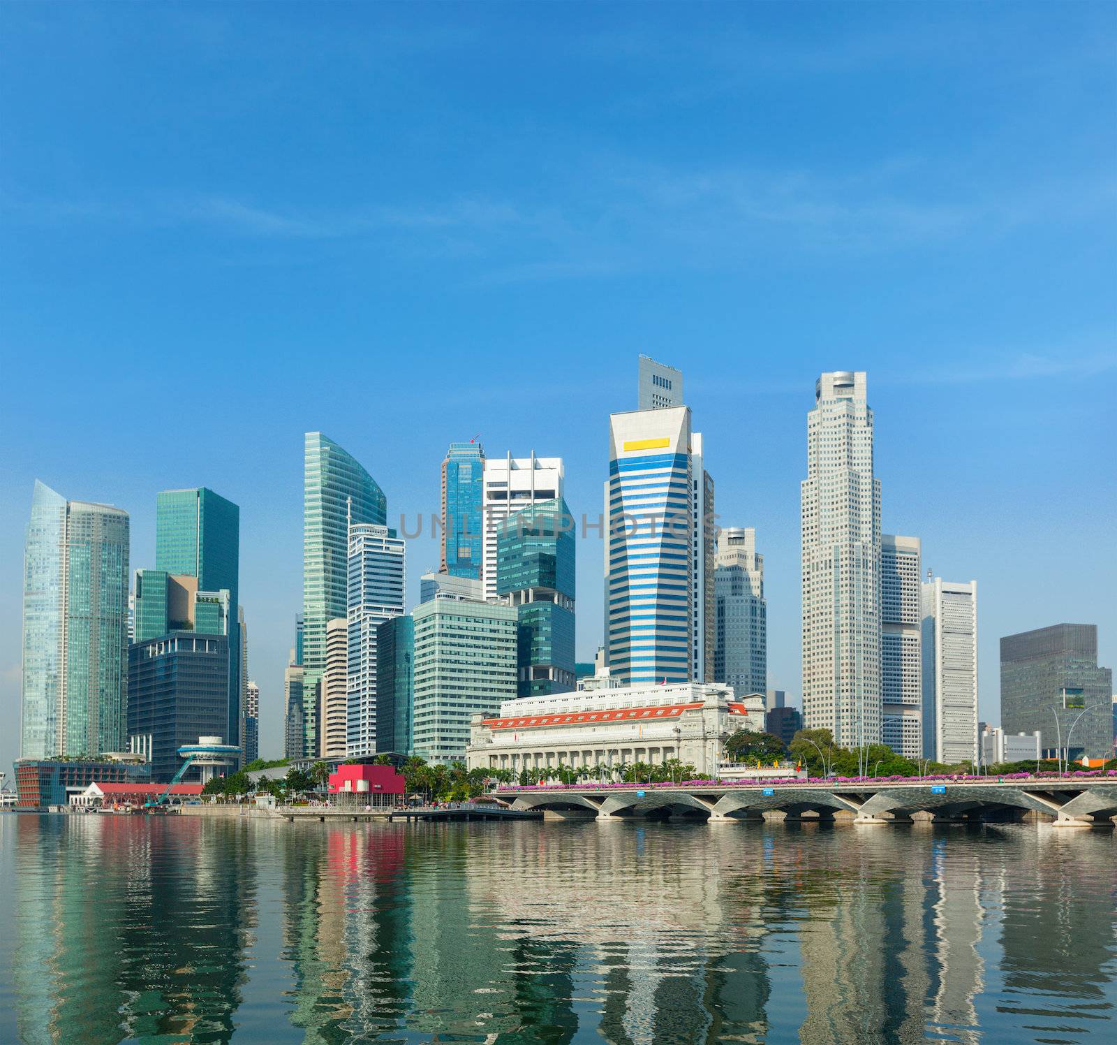 Singapore business district skyscrapers and Marina Bay in day