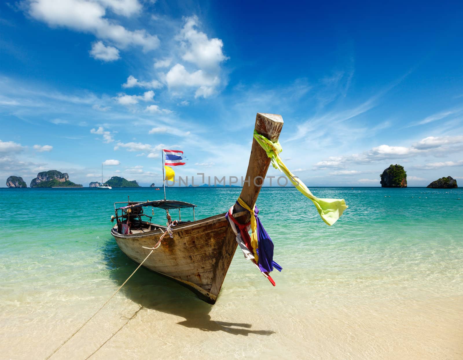 Long tail boat on beach, Thailand by dimol