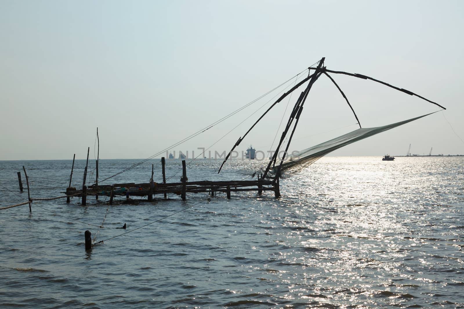 Chinese fishnets on sunset. Kochi, Kerala, India by dimol