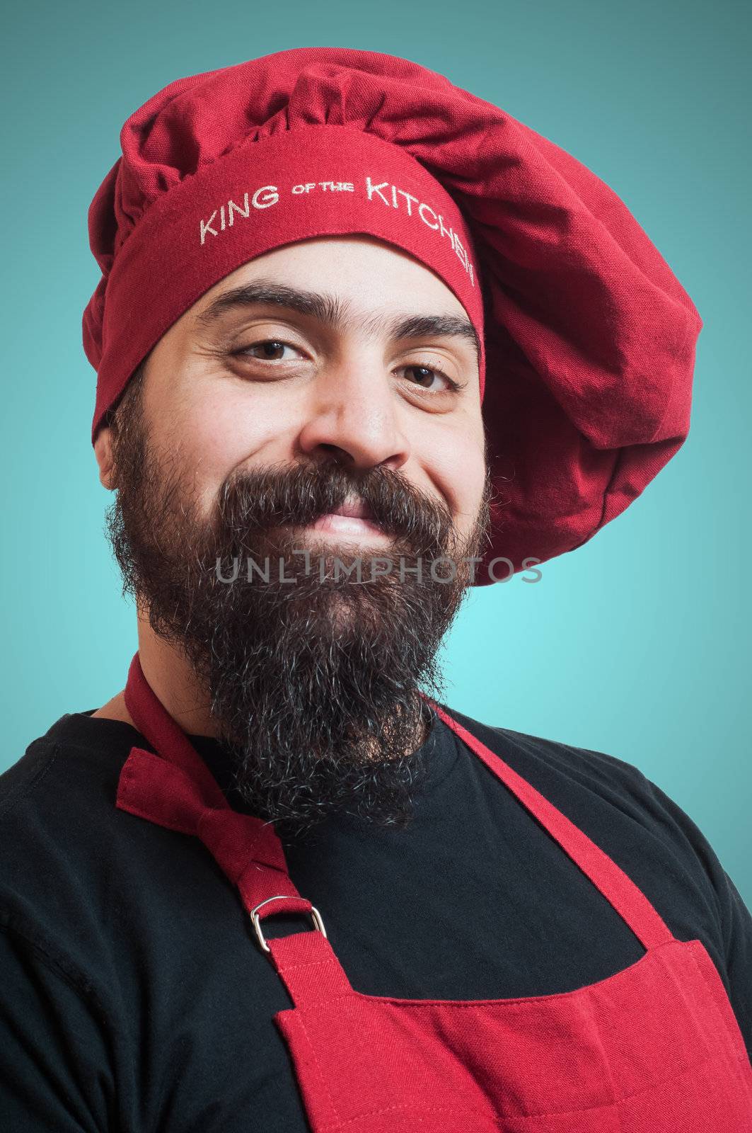 happy bearded chubby chef on blue background