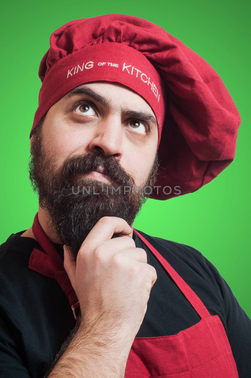 happy bearded chubby chef on green background