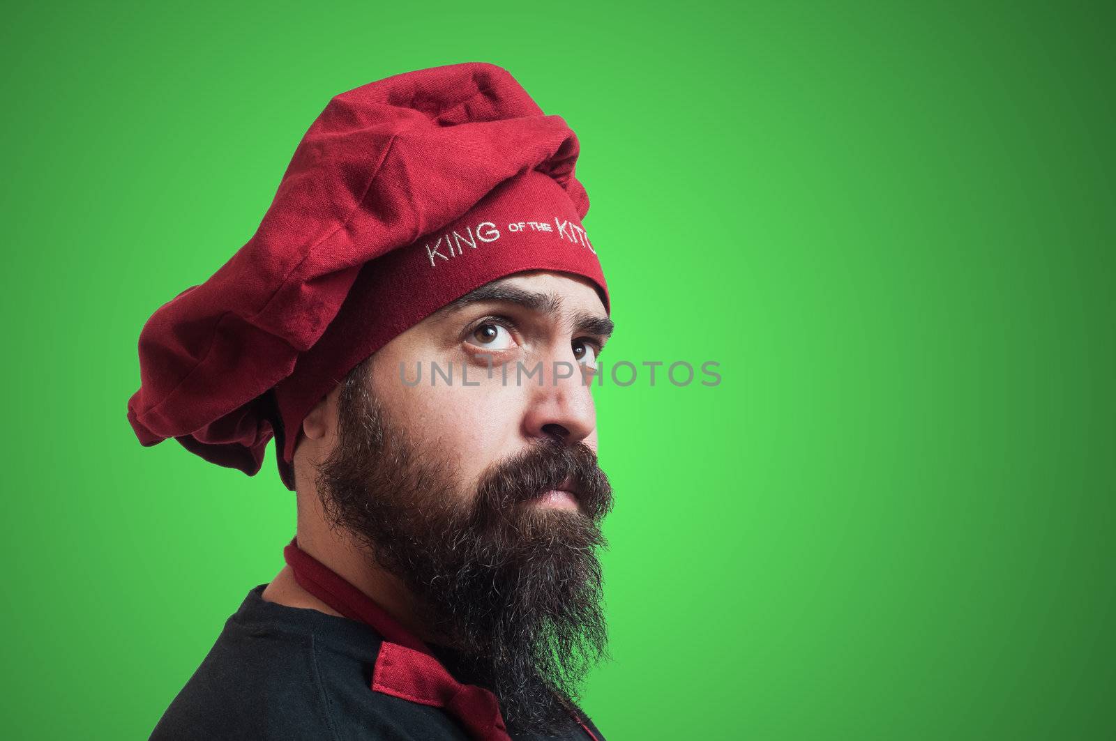 happy bearded chubby chef on green background