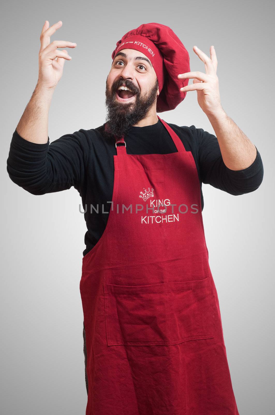 happy bearded chubby chef on gray background