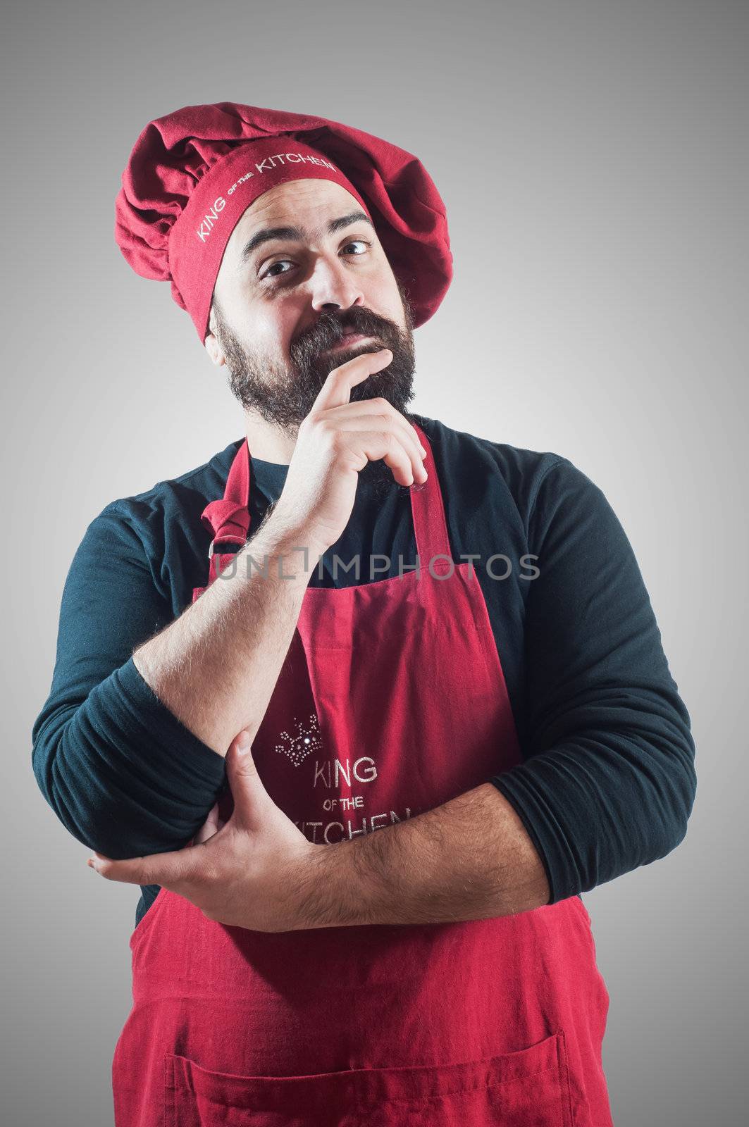 happy bearded chubby chef on gray background