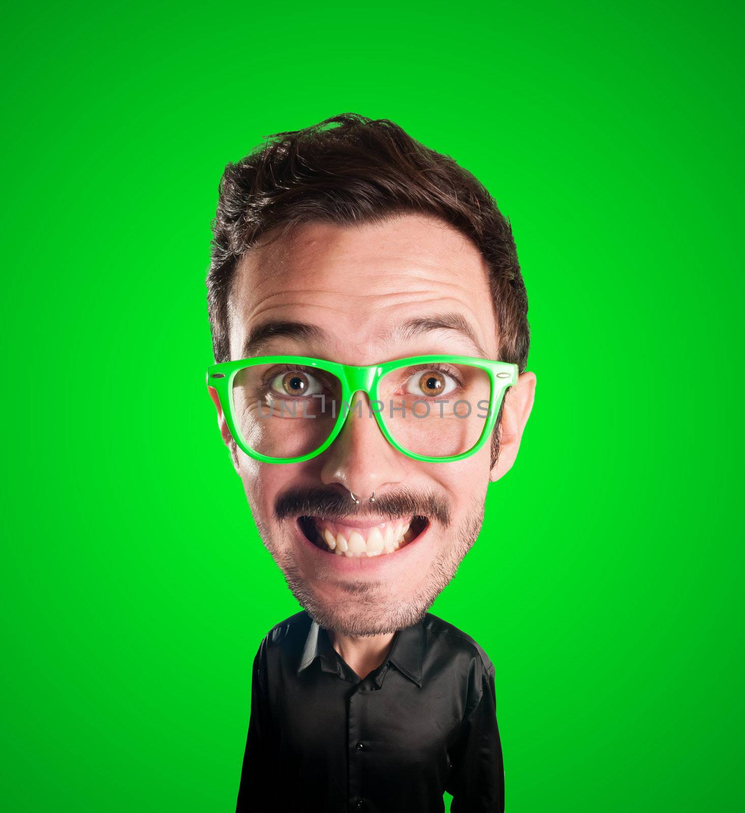 puppet man with big head on green background