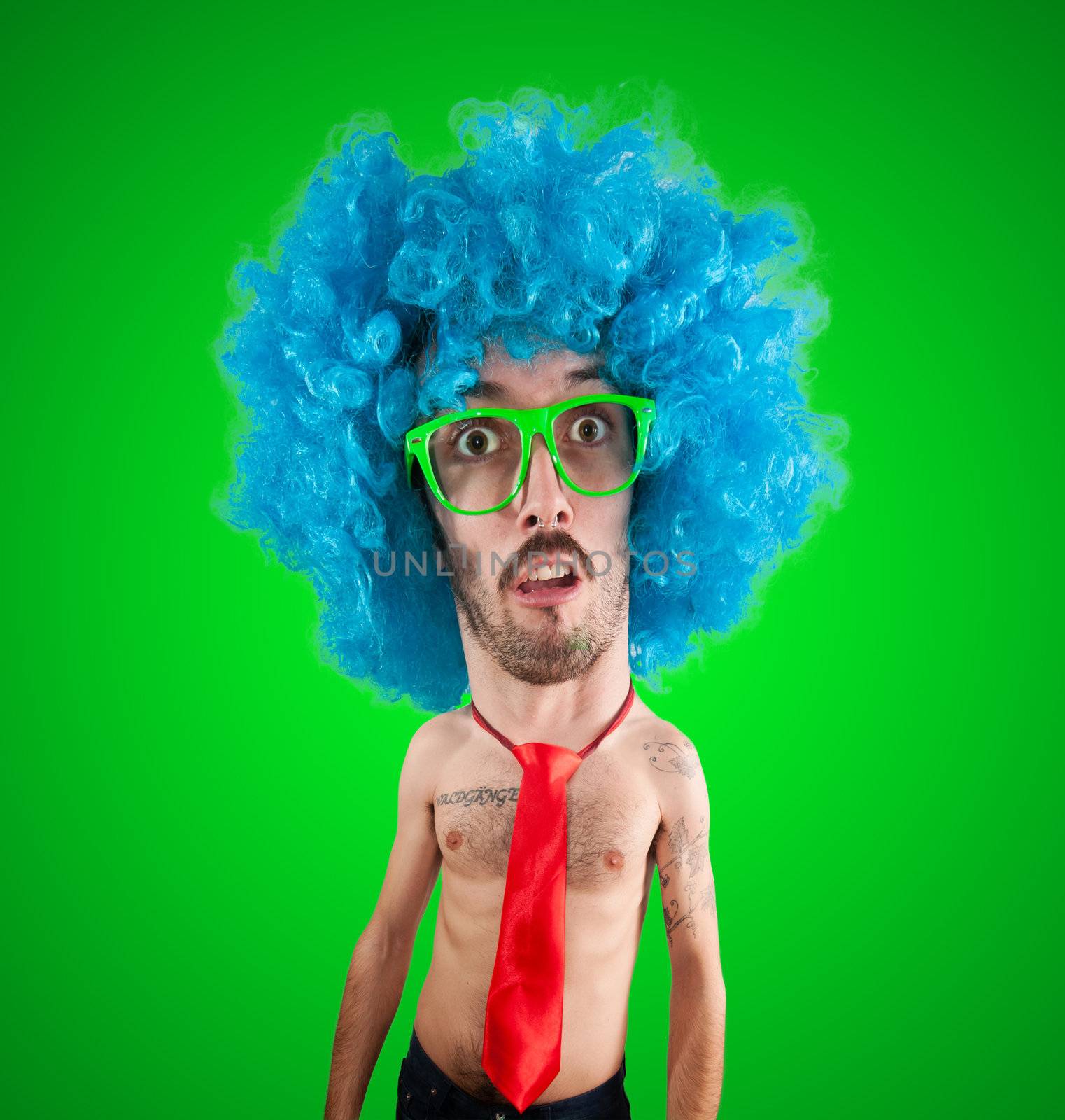 funny carnival puppet man with big head  on green background