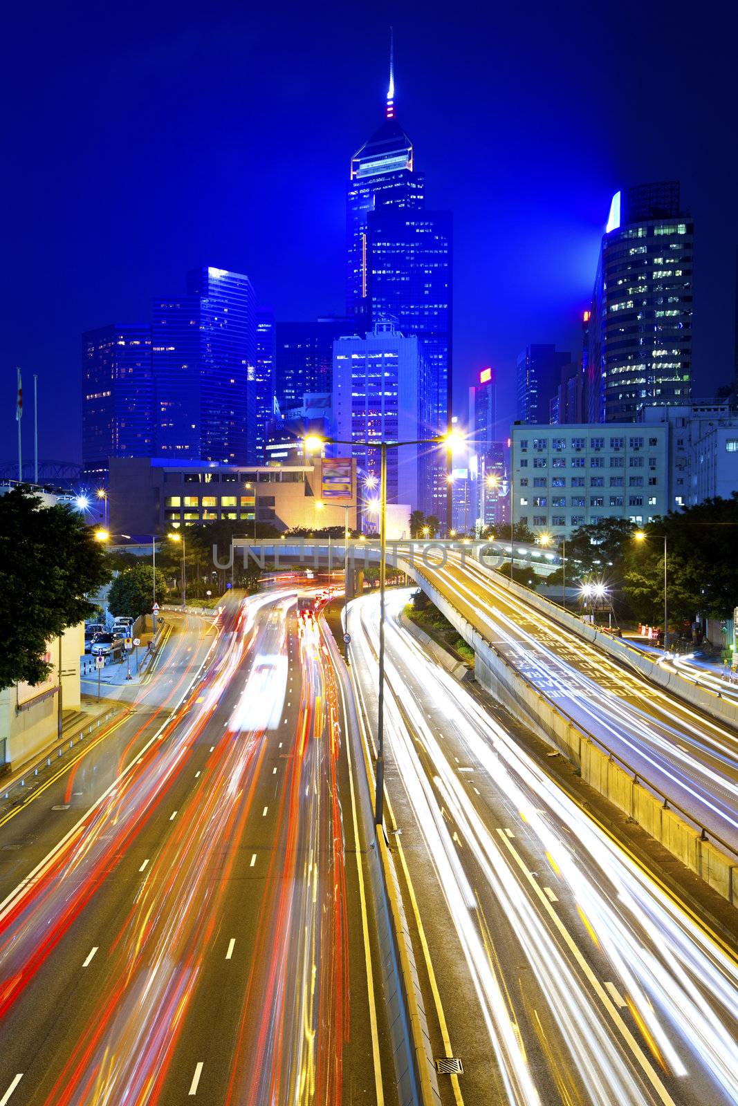 Busy traffic at night in Hong Kong by kawing921