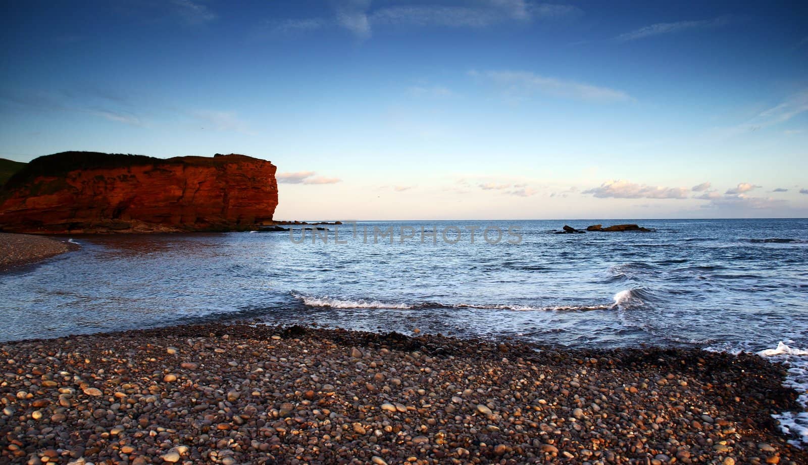 Budliegh Beach at sunset by olliemt