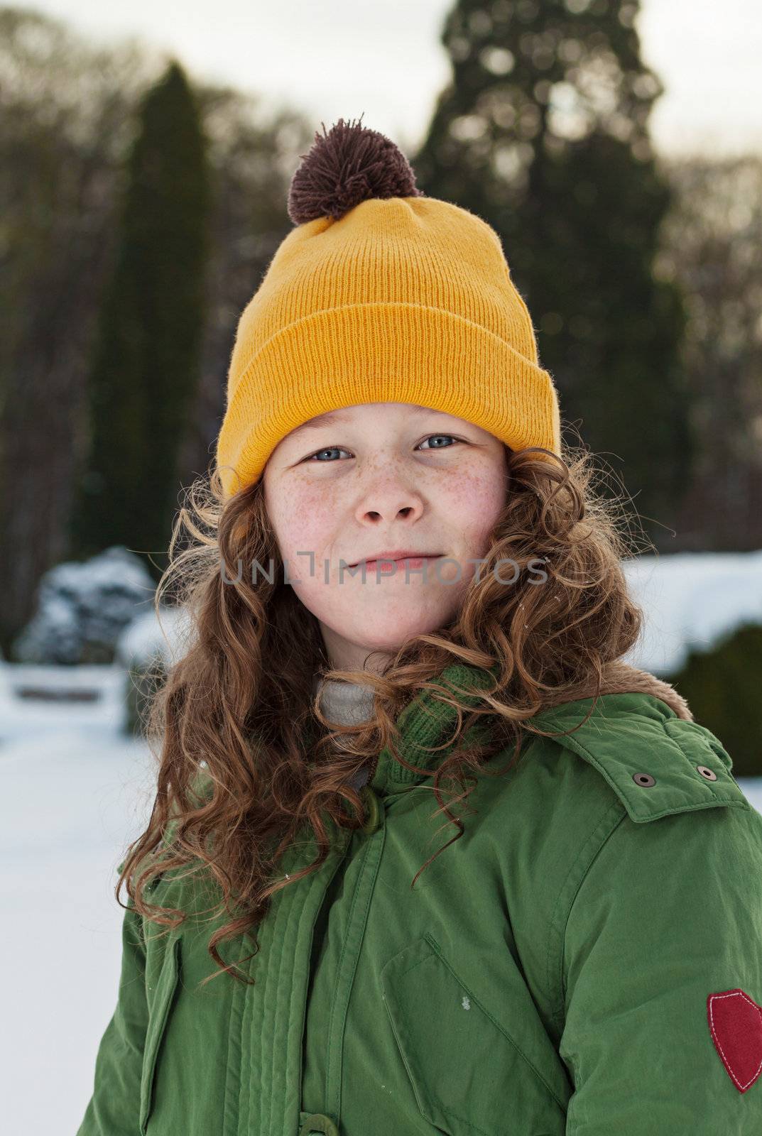 Outdoor winter portrait of a teenager girl