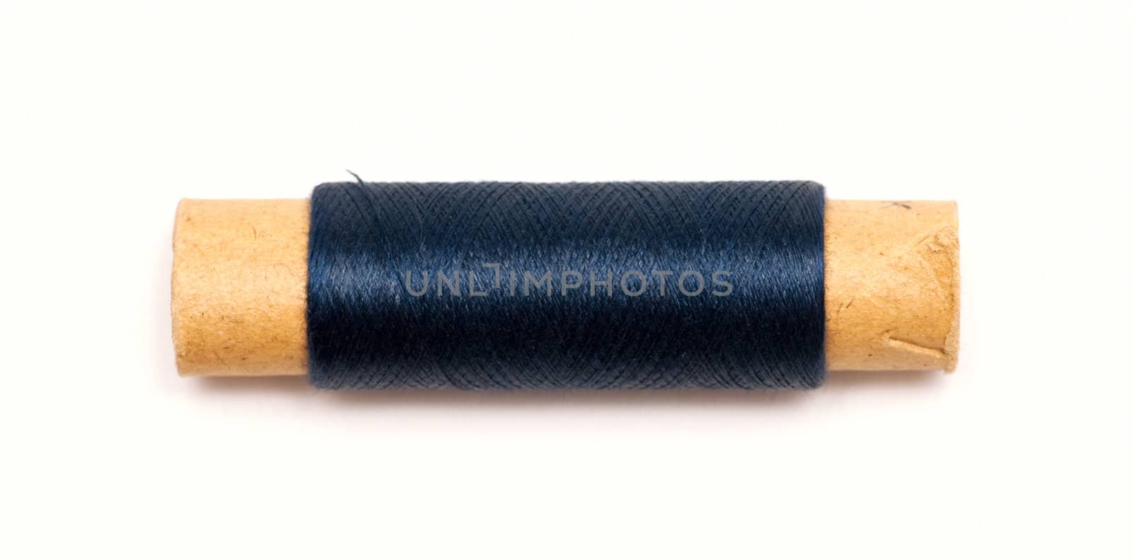 spool of thread isolated on a white background by DNKSTUDIO