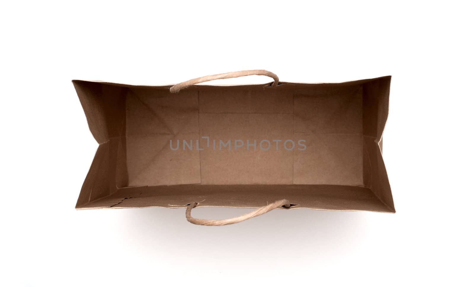 brown paper bag isolated on a white background. by DNKSTUDIO