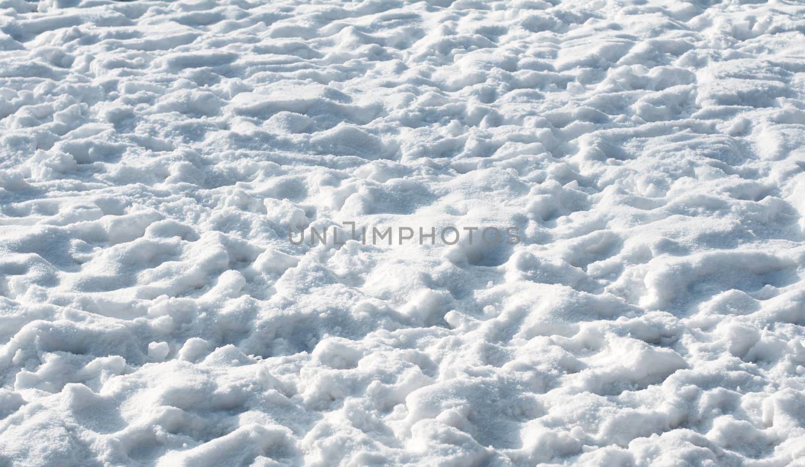 texture of the snow on a sunny day