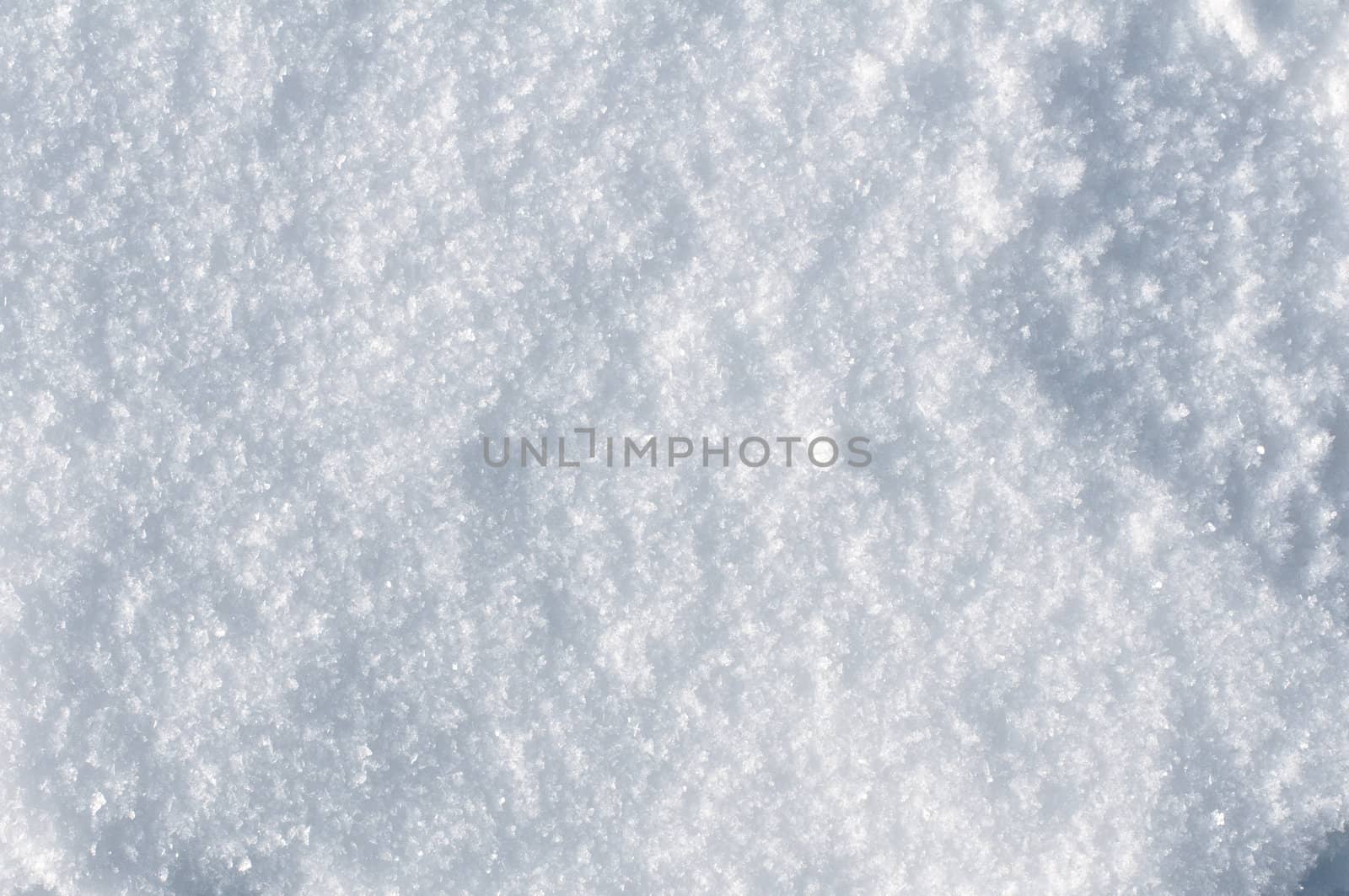 texture of the snow on a sunny day