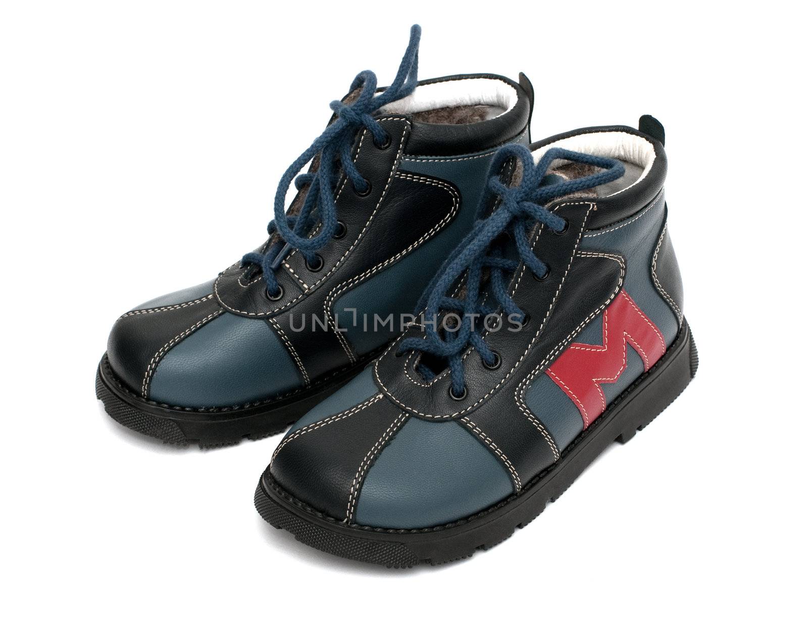 Children's winter shoes isolated over the white background