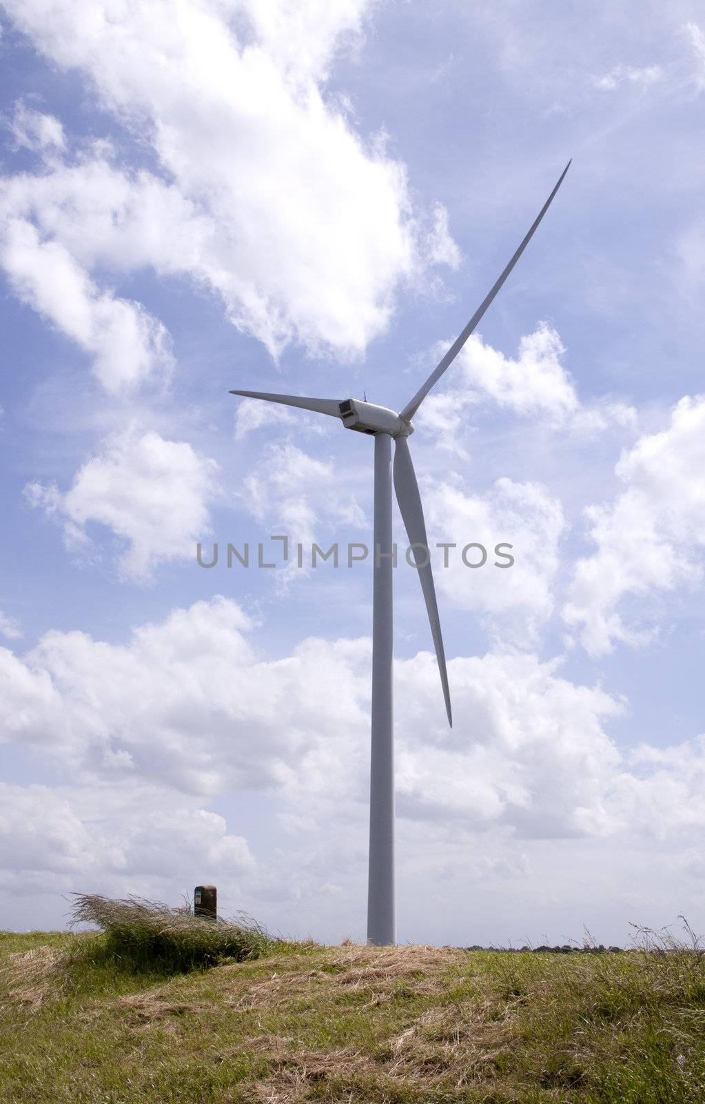 Wind-turbines on a hill in the port of Rotterdam