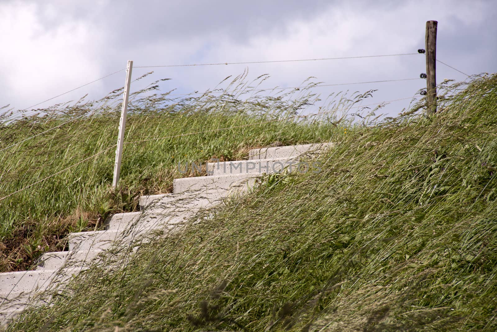 Stairs on a Dike along the coast of Holland