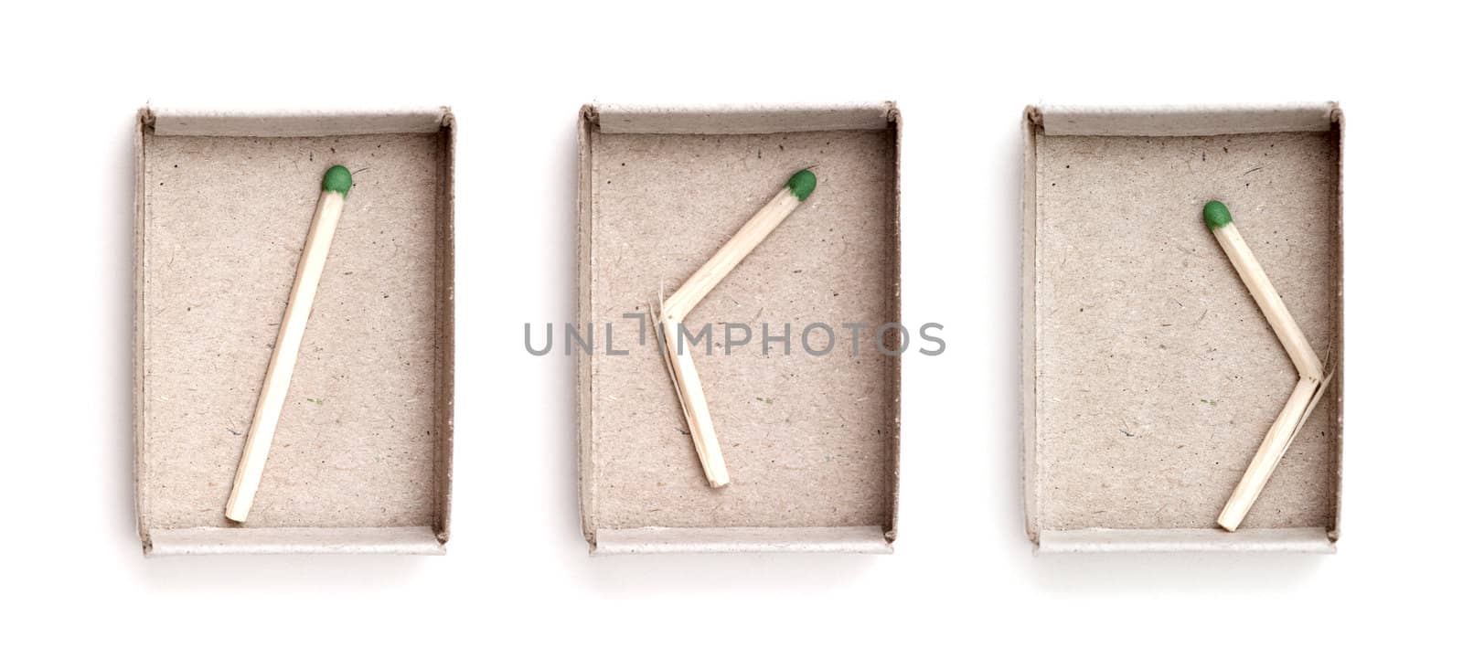 Matchbox and last match isolated on white background
