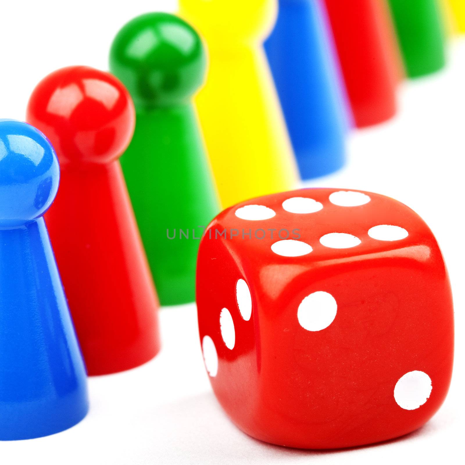 Board game Pieces and Dice over a plain white background.