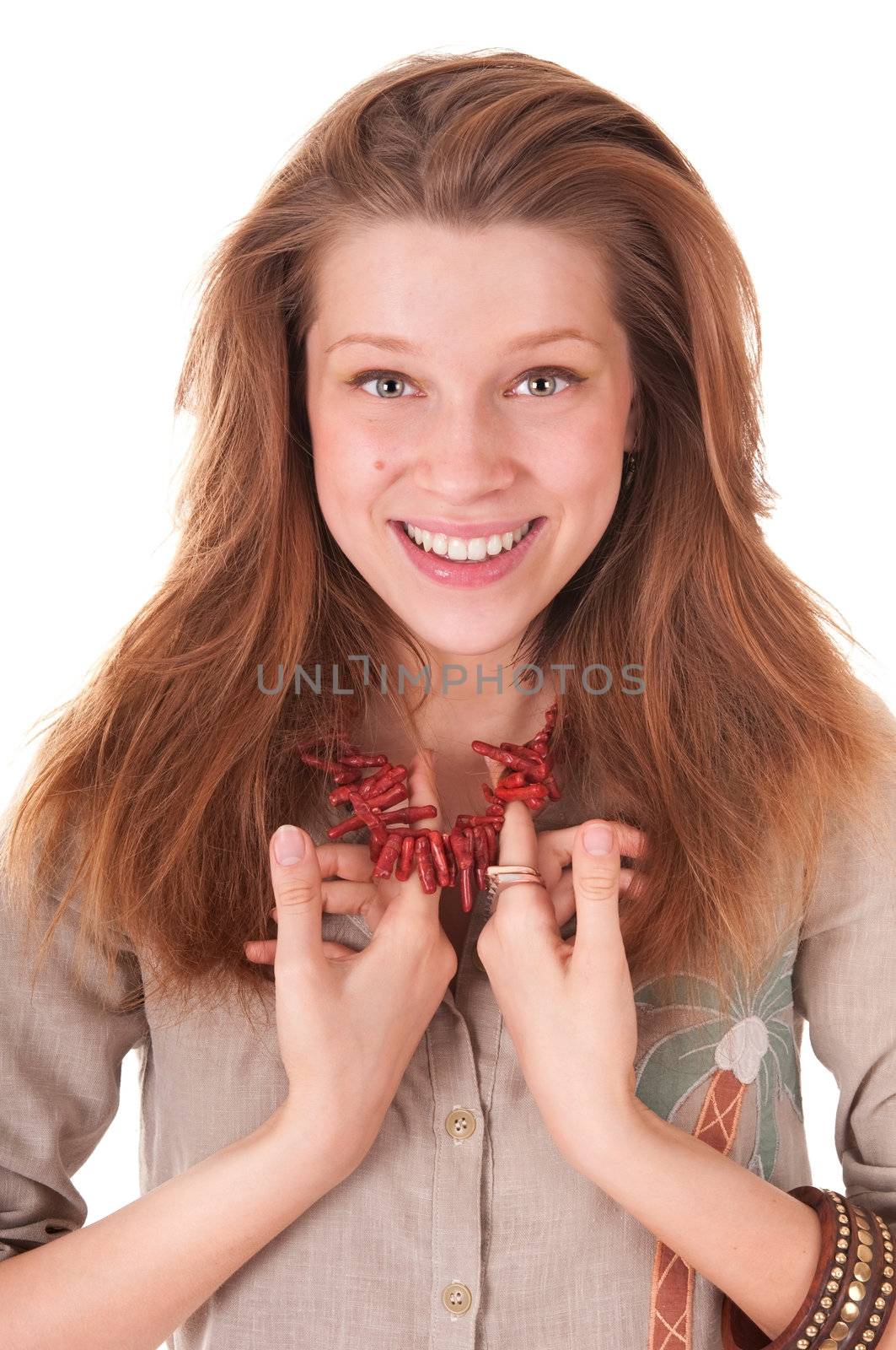 Portrait young woman is showing coral beads