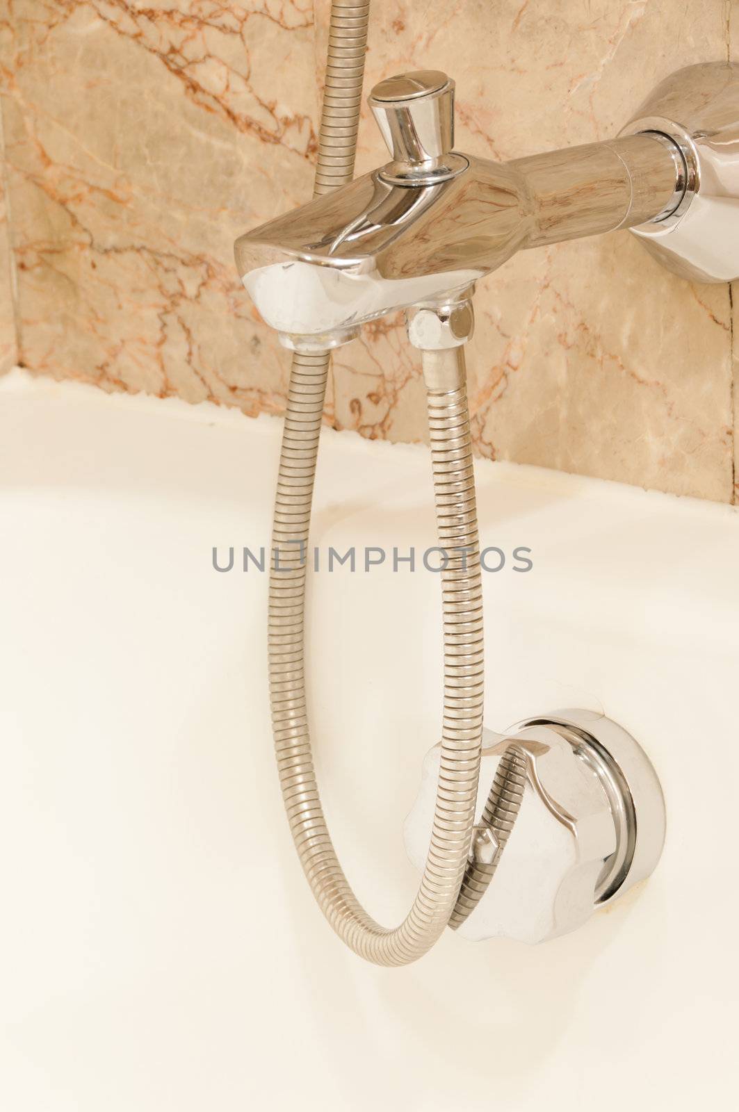 Faucet with two handles and white bath